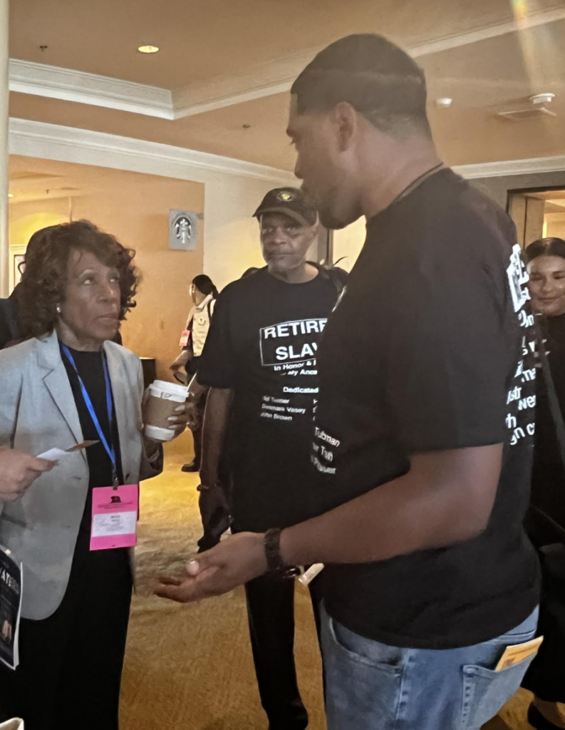 U.S.Representative Maxine Waters talking with members of the ACA 8 Coalition
at the 2024 California Democratic Party Executive Board meeting in San Diego on Friday, May 17.
